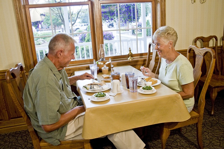 Elderly couple at dinner