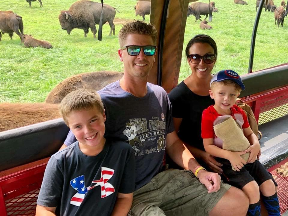 Family enjoying a tour through Cooks Bison Ranch