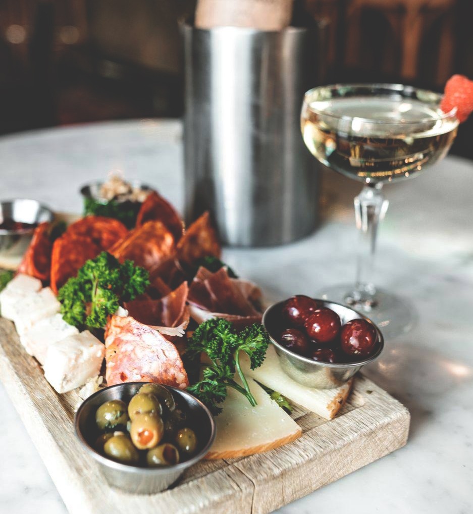 Charcuterie board and wine