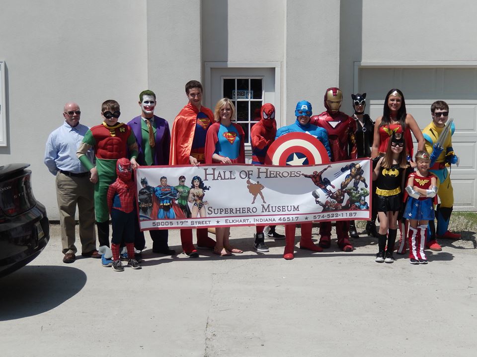 Superheroes in front of museum