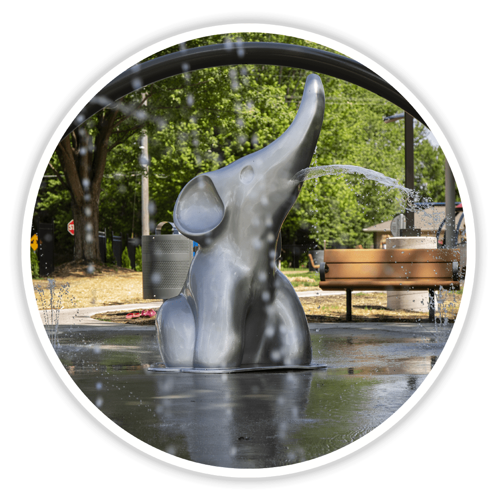Splash pad with an elephant sculpture